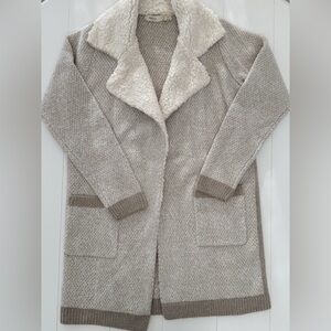 sleeping on snow sweater!